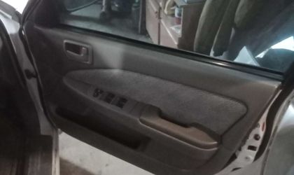 Обшивка двери передней правой Toyota Corona X (T210)
